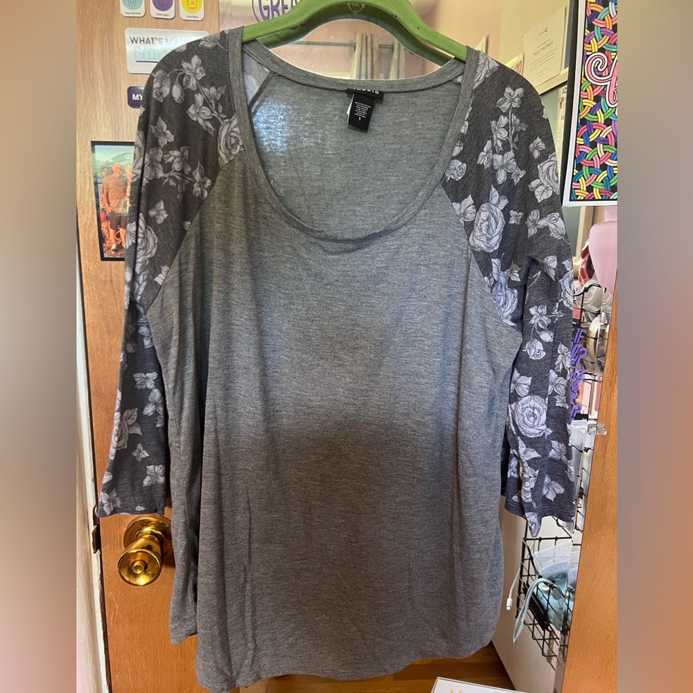 Top with floral sleeves